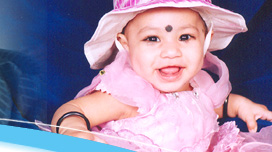 Shreshta in her pink dress with cap looking very cute.